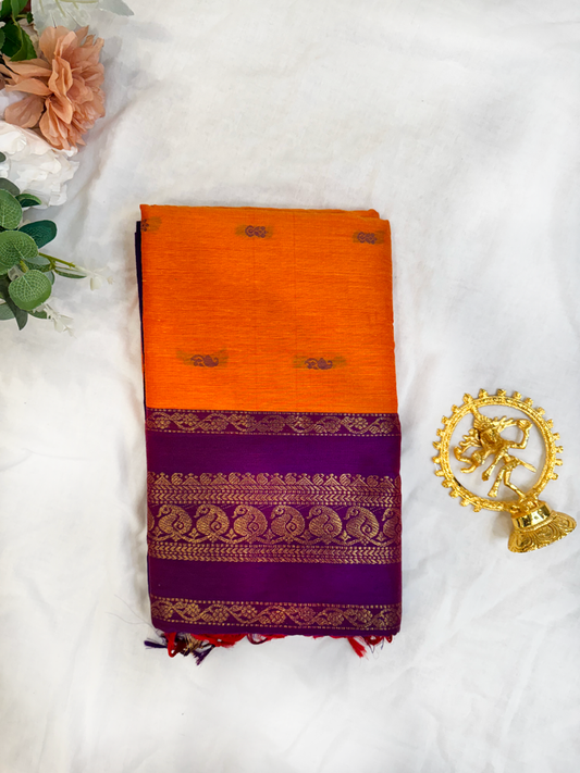 Kalyani silk cotton saree in bright orange and purple with Traditional border
