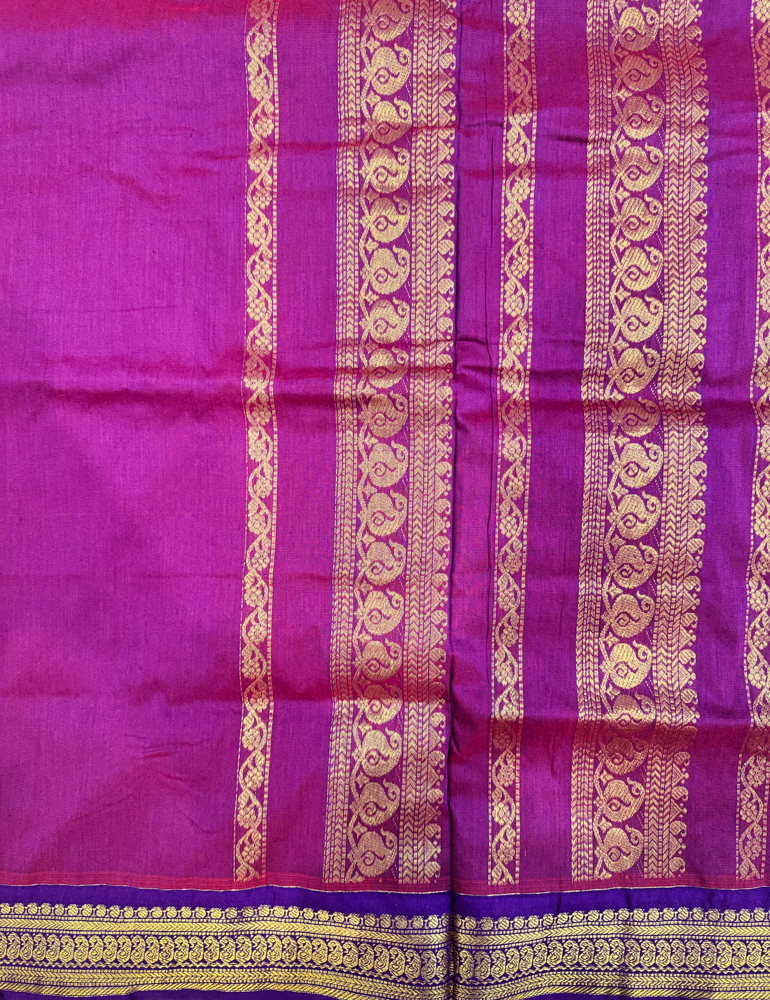 Kalyani silk cotton saree in bright orange and purple with Traditional border