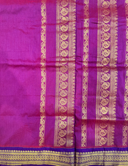 Kalyani silk cotton saree in bright orange and purple with Traditional border