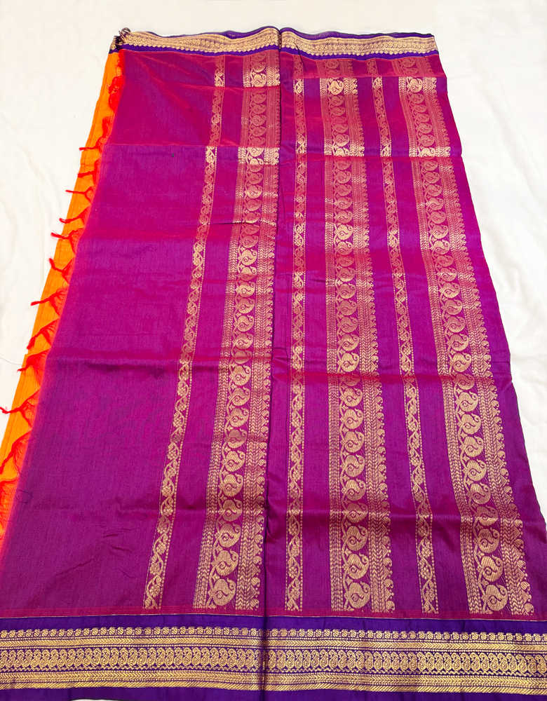 Kalyani silk cotton saree in bright orange and purple with Traditional border