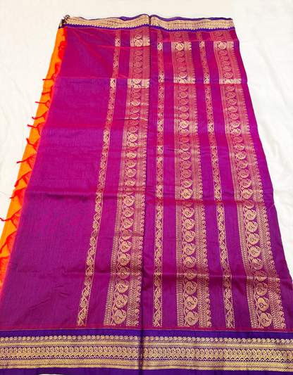 Kalyani silk cotton saree in bright orange and purple with Traditional border