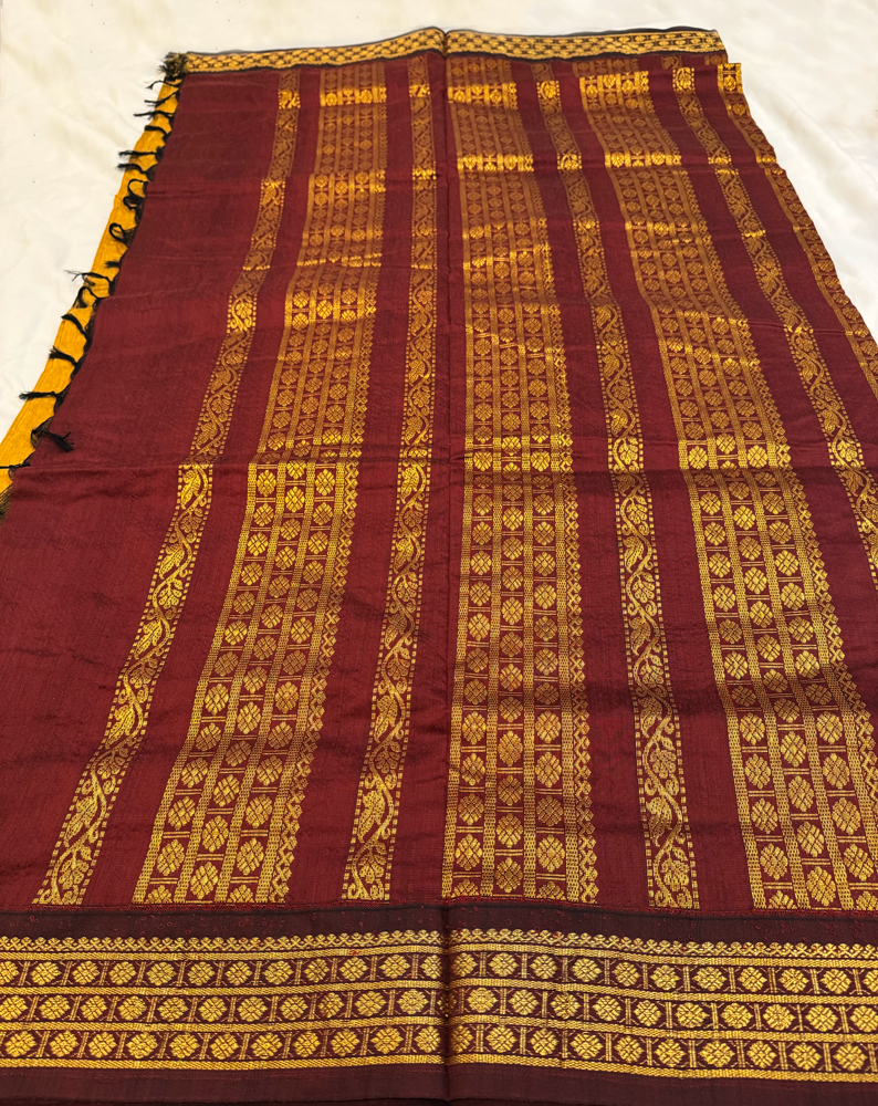 Ocher yellow Kalyani silk cotton saree with maroon pallu and traditional border