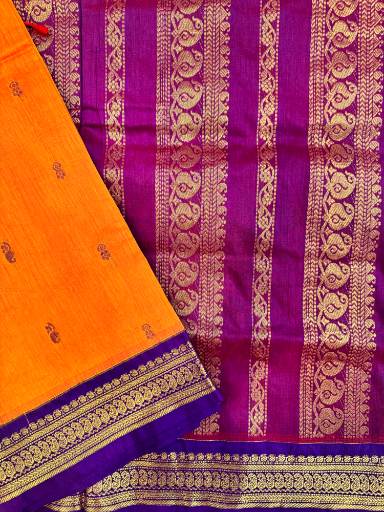Kalyani silk cotton saree in bright orange and purple with Traditional border