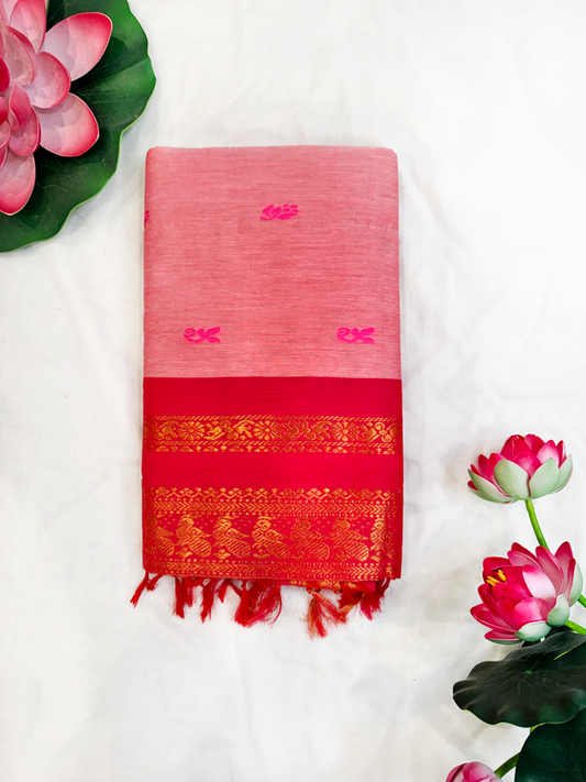 Baby pink kalyani silk cotton saree with red pallu and golden peacock border