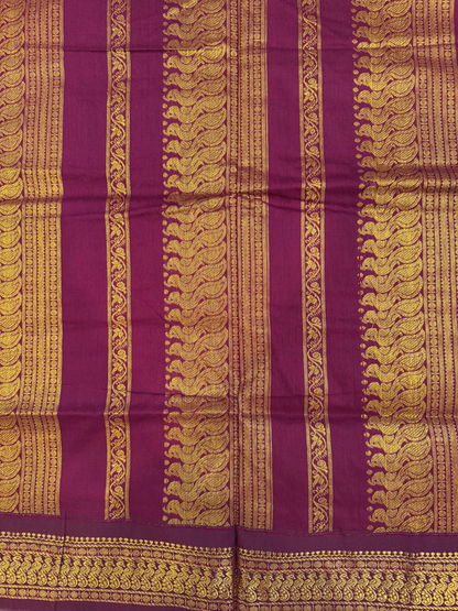 Slate blue kalyani silk cotton saree with dark purple pallu and golden peacock border