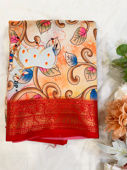 Art silk Kalamkari saree with rich pallu in red and golden peacock border