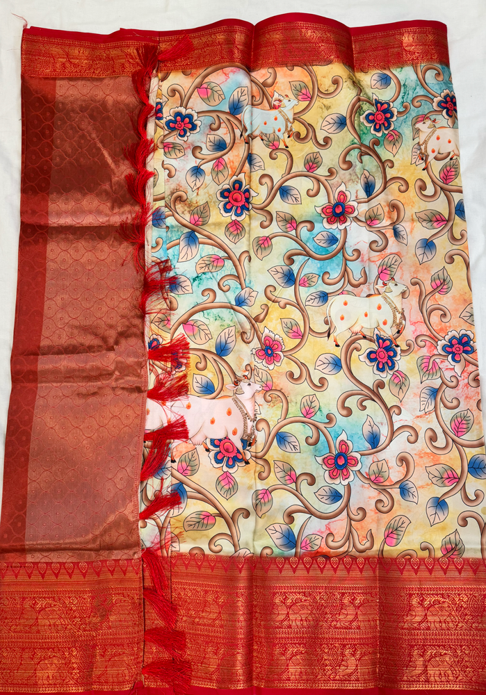 Art silk Kalamkari saree with rich pallu in red and golden peacock border