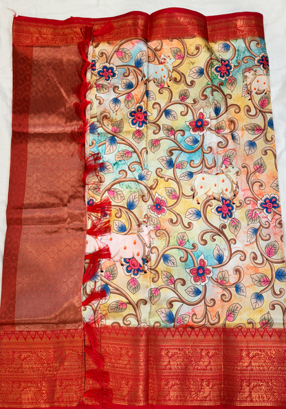 Art silk Kalamkari saree with rich pallu in red and golden peacock border