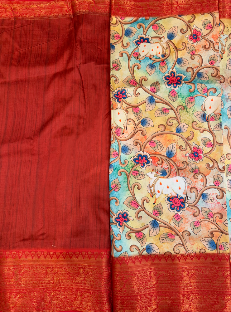 Art silk Kalamkari saree with rich pallu in red and golden peacock border