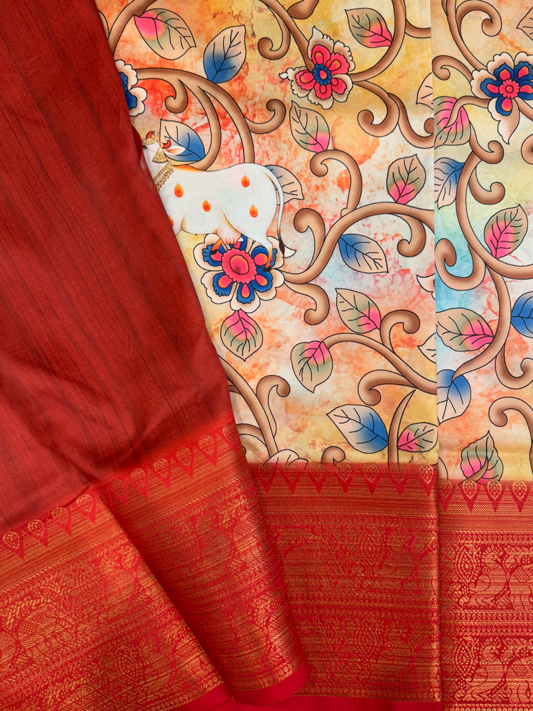 Art silk Kalamkari saree with rich pallu in red and golden peacock border