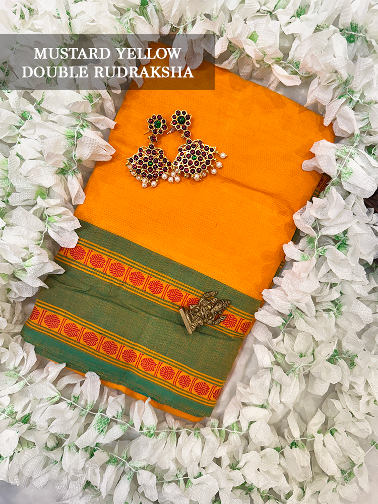 Mustard yellow saree with green border for bharatanatyam, kuchipudi and Odissi practice.