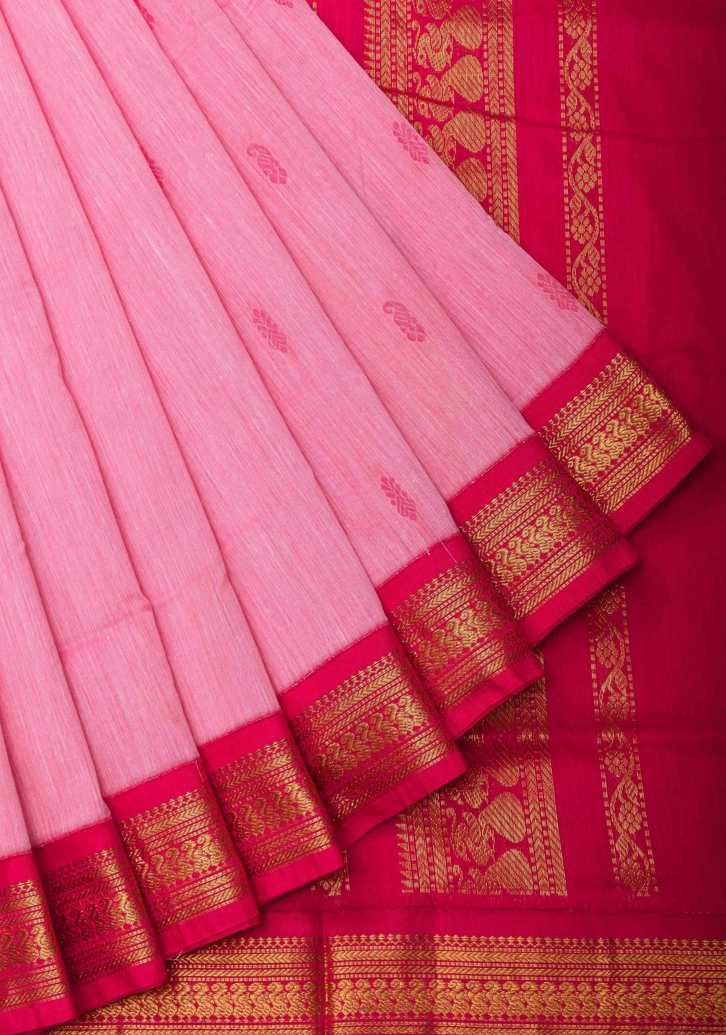 Baby pink kalyani silk cotton saree with red pallu and golden peacock border