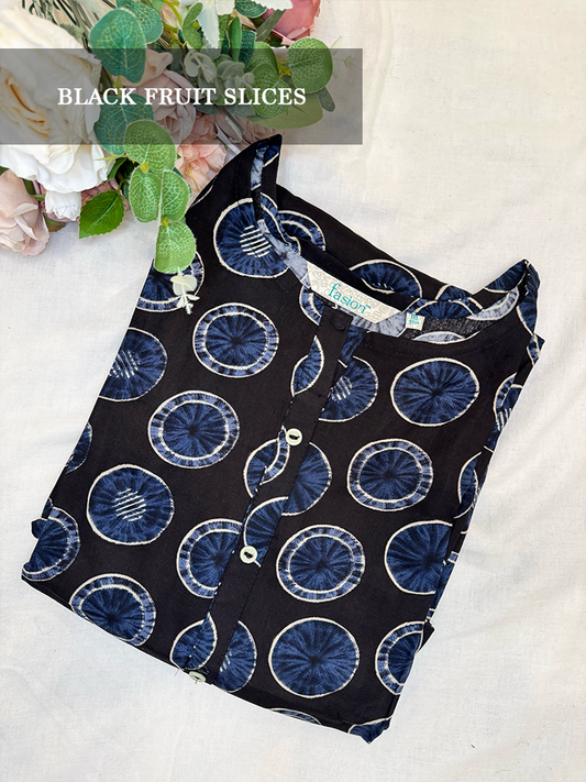 Black kurti with blue fruit slice pattern on a white background