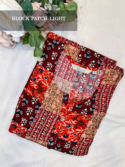 Multi color kurti with patch work design on a white background