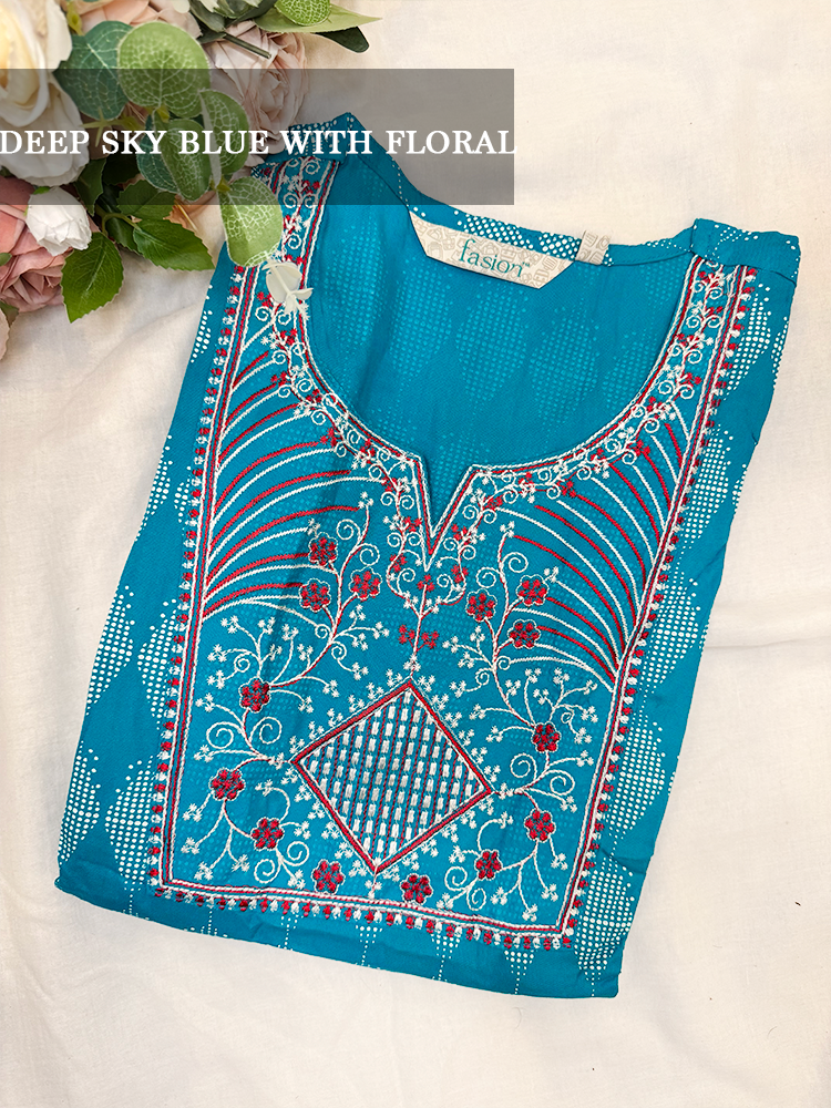 Blue embroidered kurti with floral patterns on a white background