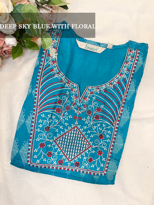 Blue embroidered kurti with floral patterns on a white background