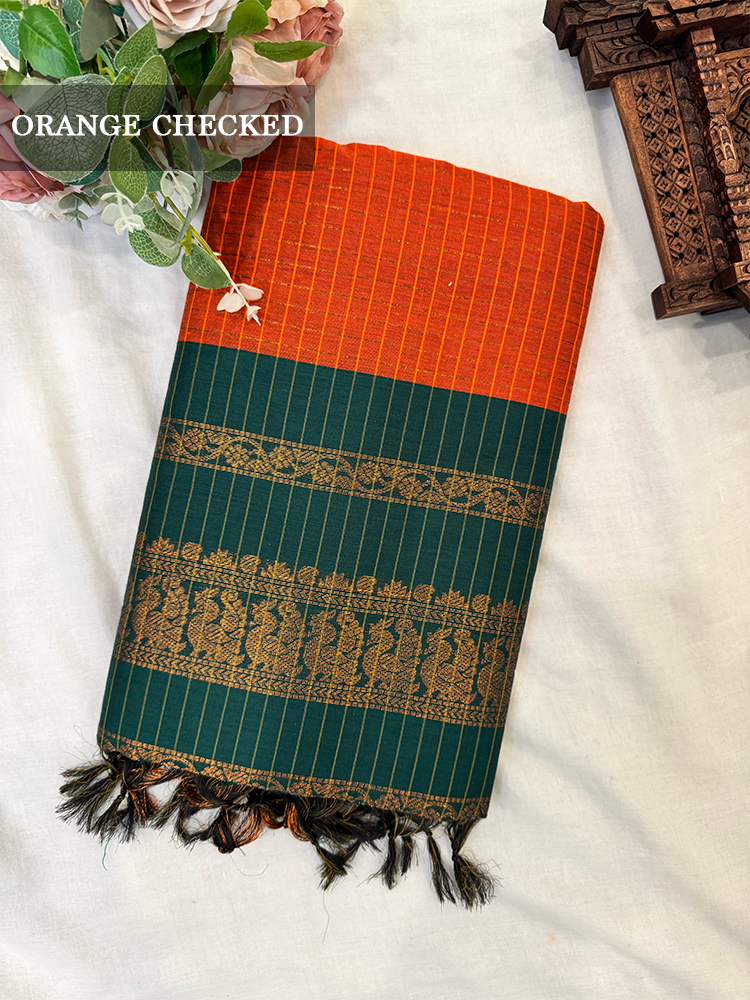 Kalyani silk cotton saree in orange checked pattern and green border. 