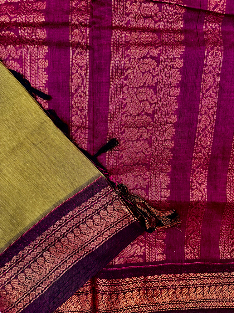 Parrot green kalyani silk cotton saree with purple peacock border