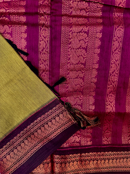 Parrot green kalyani silk cotton saree with purple peacock border