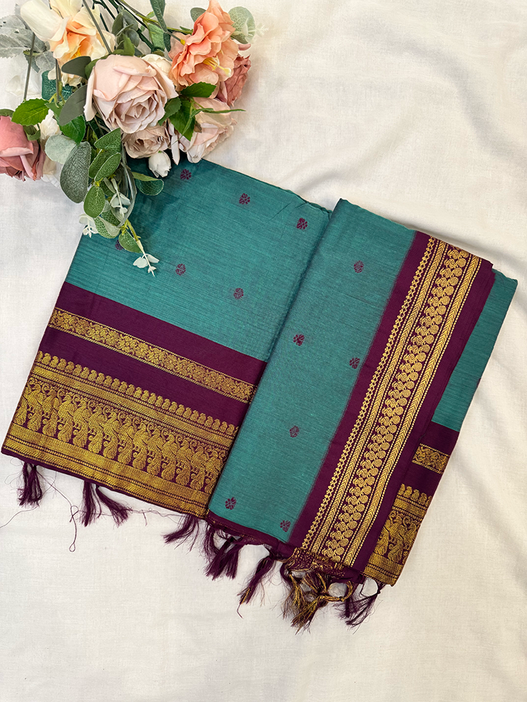 Peacock blue kalyani silk cotton saree with purple and gold border 