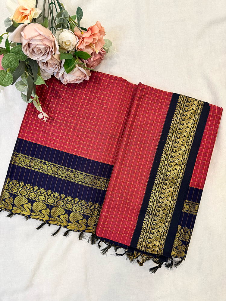 Pink kalyani silk cotton saree with navy blue and gold peacock border