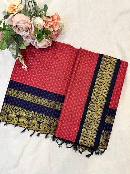 Pink kalyani silk cotton saree with navy blue and gold peacock border