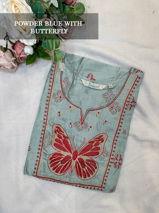 Powder blue kurti with red butterfly design on a white background
